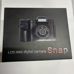 箱。カメラ本体を正面から撮影した写真とLCD mini digital camera Snapと書いてある。